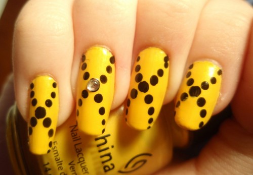 Yellow and Black Totted Nail Polish for Female